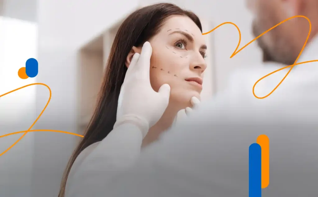 Woman in an aesthetic medicine office while a specialist evaluates her face, with marked lines on the skin as a guide for an aesthetic treatment